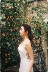 Robe midi en soie à bretelles dos nu avec fente jusqu'aux cuisses et décolleté carré